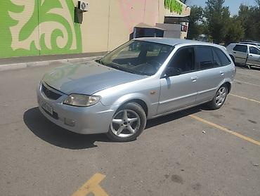 e53 amg: Mazda 323: 2003 г., 1.5 л, Механика, Универсал — 5