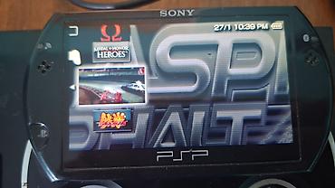 psp konsol: PSP Go satılır. Konsol çox səliqəli istifadə olunub və tam işlək — 3