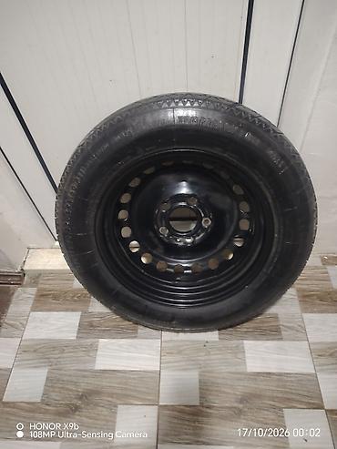 disk teker barter: Zavod BMW E46 nın üzərinde gələn zapas təkər, continental firması, təp — 3