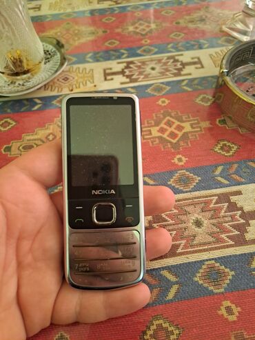 ���������������� ���������� 6700: Nokia 6700 Slide | 2 ГБ | цвет - Серый | Кнопочный