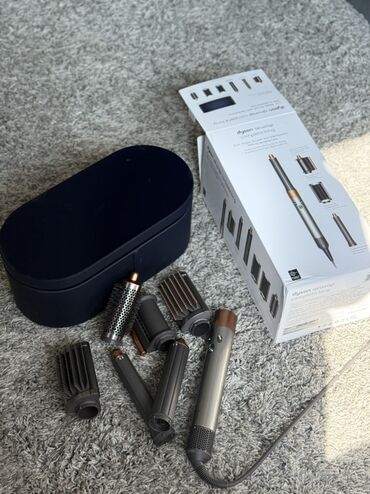 модели для фото: Мультистайлер Dyson, Для выпрямления