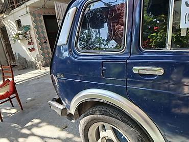 lada diskləri: LADA Niva 4x4, mavi rəng, 5 qapılı universal kuzov. Xüsusiyyətlər: - — 4