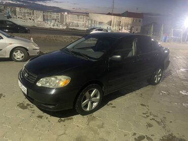мазда 323 1994: Toyota Corolla: 2003 г., 1.8 л, Автомат, Бензин, Седан
