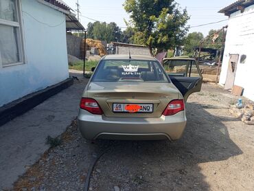 возможен обмен на дом: Chevrolet Lacetti/Daewoo Gentra (седан), золотистый цвет кузова