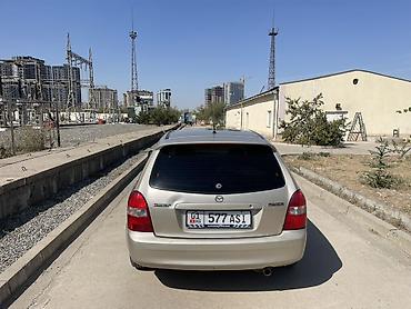 ротационная борона: Mazda 323: 2001 г., 1.6 л, Механика, Бензин, Универсал — 6