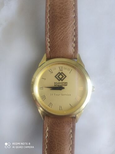 позолоченные часы: Позолоченные часы "Кумтор". Хороший подарок. Кожаный ремешок. Цена:30
