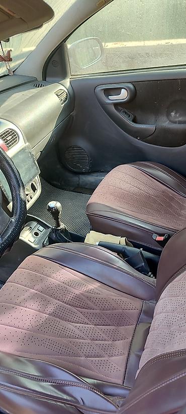 араван газ 69: Opel Corsa: 2003 г., Кол менен иштөөчү, Бензин, Хетчбек — 4