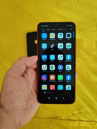 Xiaomi Mi 9T, 64 ГБ, цвет - Оранжевый, 
 Отпечаток пальца, Две SIM карты