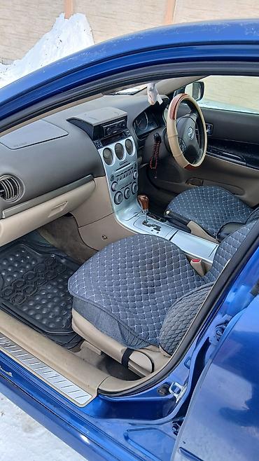 Другие детали салона: Mazda Atenza (правый руль) — интерьер - Салон бежево‑черный, тканевые — 3