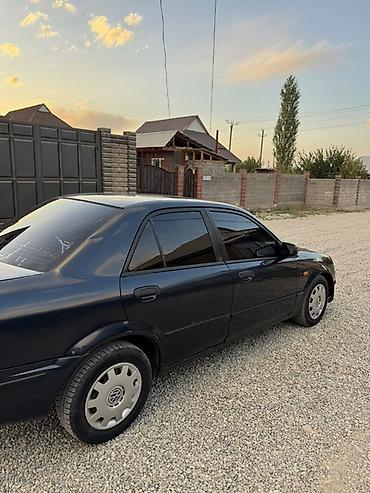 Унаа сатуу: Mazda 323: 1999 г., 1.6 л, Кол менен иштөөчү, Бензин, Седан — 2