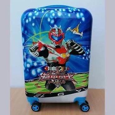 Rančevi, torbe i koferi: Dečiji putni kofer sa upečatljivim dizajnom crtanog junaka. Kofer je — 10