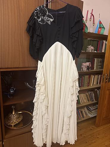 Podium boutikden alınıb bir bir defe geyilib 300 azn e
