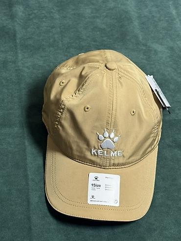 одежд: Кепка KELME Heritage, унисекс - Цвет: бежевый (песочный) - Логотип — 3