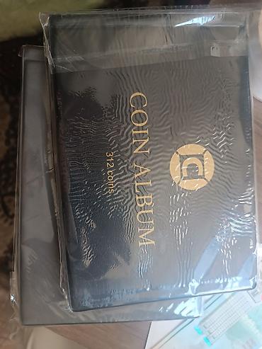 Məhsul: Sikkə albomu Təsvir: - Üz qabığında “COIN ALBUM” yazısı və