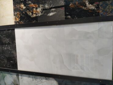 Dekorativ daşlar: Ağ-qəhvəyi dumanı xatırladan naxışlı böyükformat keramika/plastik