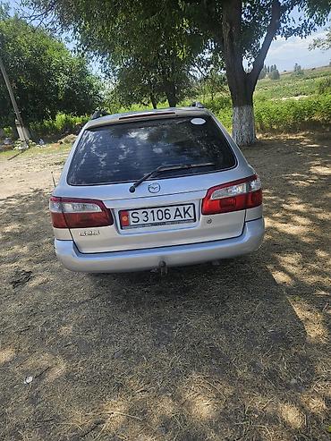 лад крузер: Mazda 626: 2001 г., 2 л, Механика, Бензин, Универсал — 8