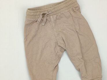 smyk kurtki chłopięce: Spodnie dresowe, H&M, 6-9 m, stan - Dobry