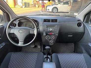 дайхатсу мобе: Daihatsu Cuore: 2009 г., 1 л, Автомат, Бензин, Хэтчбэк — 5