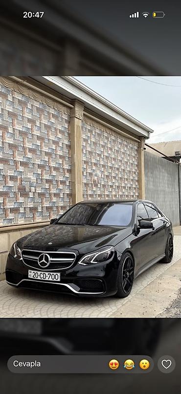 mersedes saat: Mercedes-Benz E-Class, 2009 il. Sedan, qara rəng. AMG üslublu xarici — 2