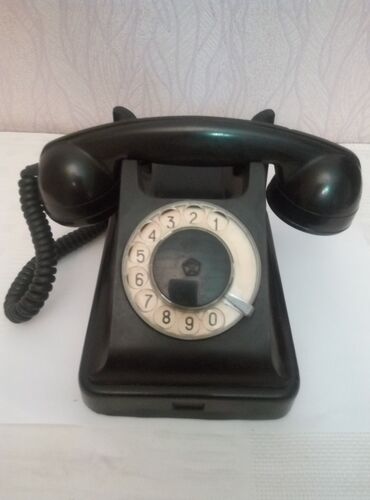 telefon temiri: Disklə işləyən qədimi telefonların təmiri. Telefonun işləməyən