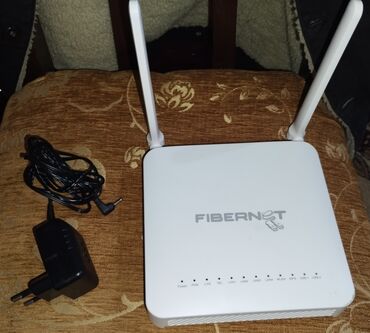 fibernet modem: Fibernet Modem. Tezedir 70 manata alinib problemsizdir. 100 mb/san