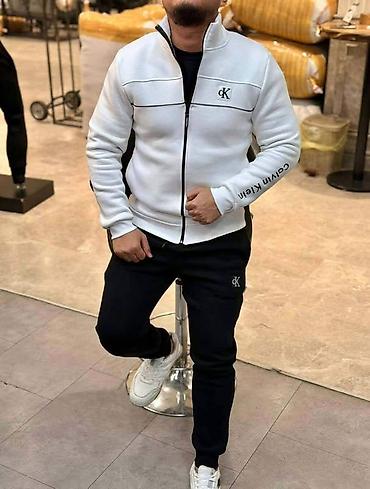 ski pantalone decathlon: Muška komplet trenerka u sportskom Calvin Klein stilu, izrađena od — 1
