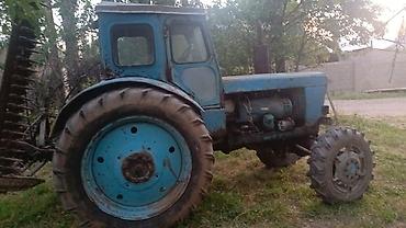 Трактор колесный, с кабиной. Класс тяги ориентировочно 1,2–1,4 тс