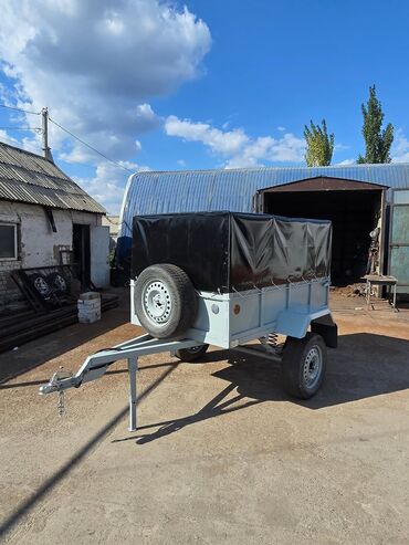 Qoşqular: Yük qoşqusu – tək oxlu, yanları hündür, karkaslı və brezent örtüklü - — 9
