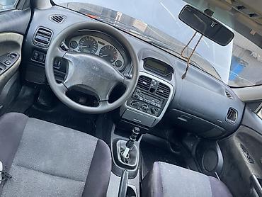 экскаватор ремонт: Mitsubishi Carisma: 2003 г., 1.6 л, Механика, Бензин, Седан — 10