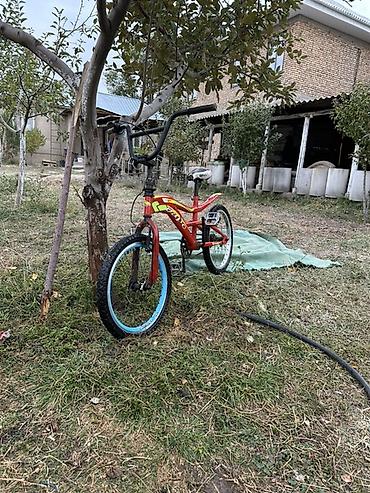дисктер 16: Детский велосипед в стиле BMX, красного цвета. Особенности: - прочная — 4