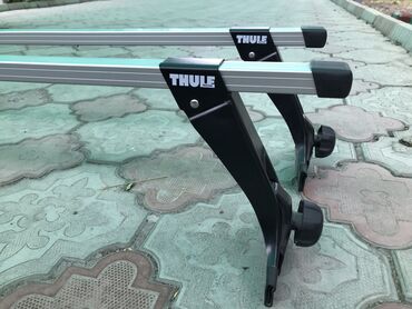 Тюнинг: Поперечные Рейлинги фирма Thule оригинал новые. Длинна 150 см
