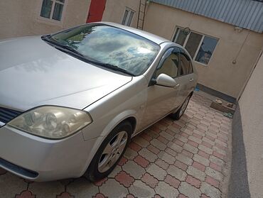 приматок прямоток: Автомобиль Nissan Primera P12 в кузове седан, выполненный в