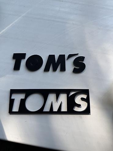 Тюнинг: Шильдик TOM’S 
Шильдик тюнинг ателье томс тойота 
Toms toyota racing — 1