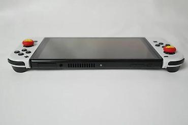 Nintendo Switch: U ponudi je Nintendo Switch OLED (čipovan). Memorija: 256 GB + 64 GB — 8