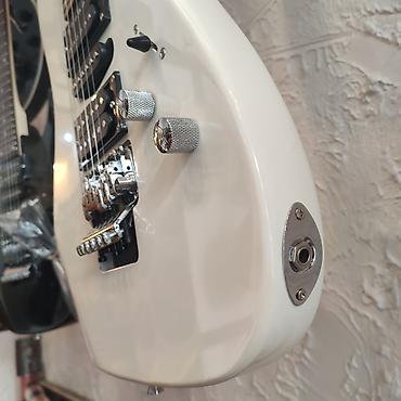 Гитары: Elektro-gitara Smiger S-G5 Simlərin sayı: 6 Üst: Cökə ağacı Qol — 1