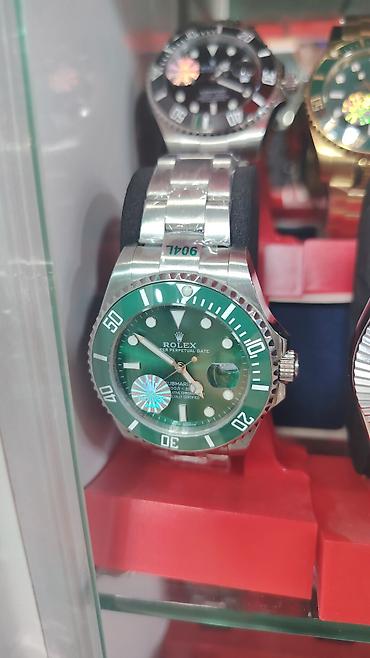 idman saati: Məhsul: Kvars mexanizimli dalğıc tərzli qol saatları (Submariner — 2