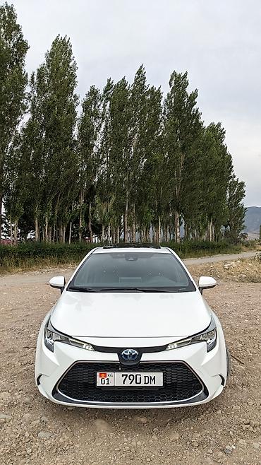 byd e6: Toyota Corolla: 2023 г., 1.8 л, Вариатор, Гибрид, Седан — 1