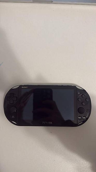 PS Vita (Sony Playstation Vita): Playstation vita ideal veziyyetdedir. Hec bir problemi yoxdu. Ciziqi — 8