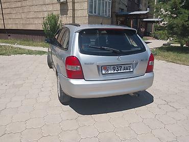 a8 d2: Mazda Familia: 1999 г., 1.6 л, Механика, Бензин, Универсал — 4