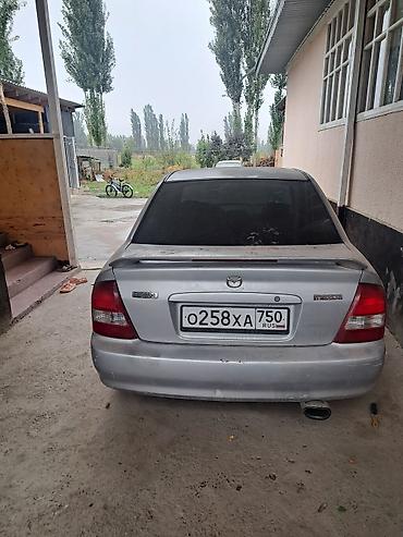 масквич машина: Mazda 323: 2000 г., 1.6 л, Автомат, Бензин, Седан — 3