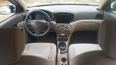 Hyundai: Hyundai Accent: 1.4 l | 2009 il Sedan — 13