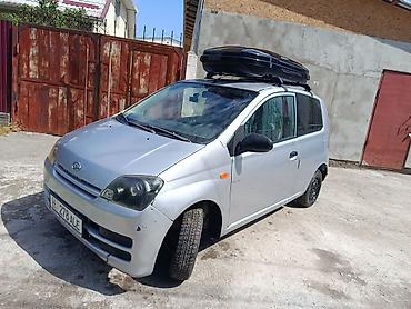 bus: Daihatsu Cuore: 2005 г., 1 л, Механика, Бензин, Купе — 2