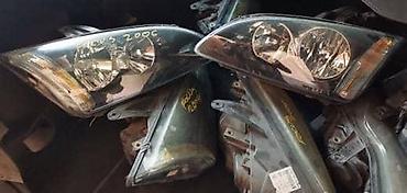 Glave motora: FAROVI ZA SVA VOZILA ZA FORD BRONCO, C-MAX, CAPRI . OD 2000. DO — 12