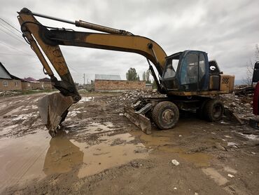 Экскаваторы: Экскаватор, 2008 г., Колесный — 13