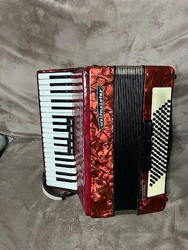 Аккордеоны: Аккордеон Weltmeister (кнопочно-клавишный), красный перламутровый — 1