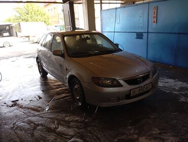 продаю или меняю с доплатой мне: Mazda 323: 2000 г., 2 л, Механика, Дизель, Хэтчбэк