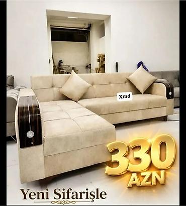L formalı yumşaq künc divanı. Bej rəngdə zərif dizayna malikdir və