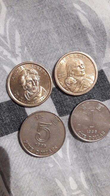 монет: Один и 5ти долларовые монетки