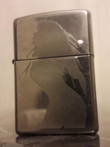 Digər aksesuarlar: Məhsul: Zippo benzinli alışqan Təsvir: - Orijinal Zippo, alt hissədə — 1