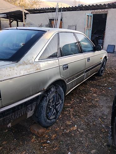 вампер 124: Mazda 626: 1990 г., Механика, Бензин, Хэтчбэк — 1